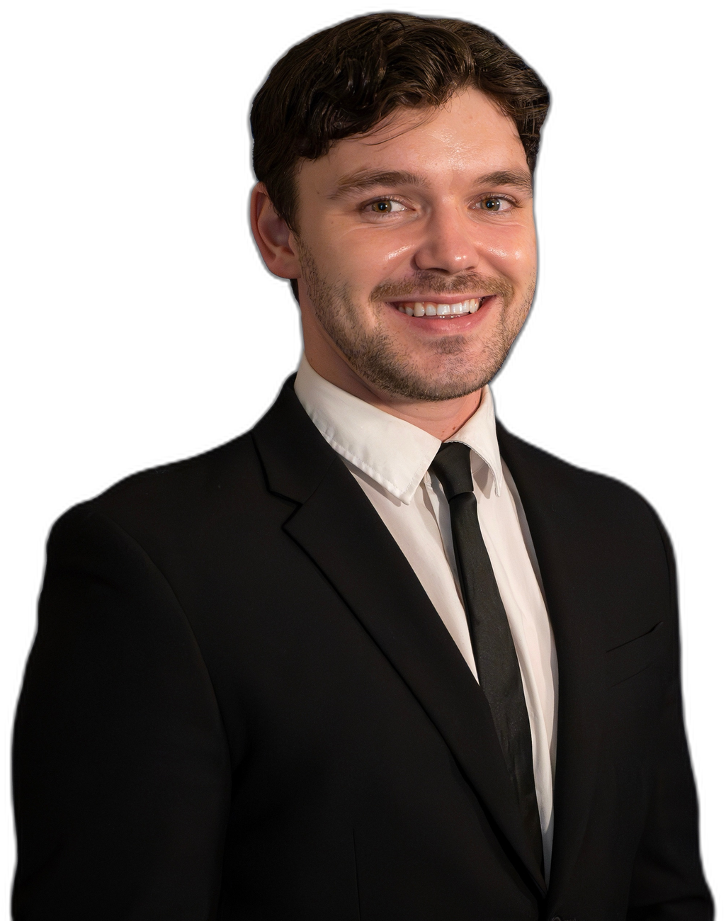 Greg Stinson, smiling, in a dark suit